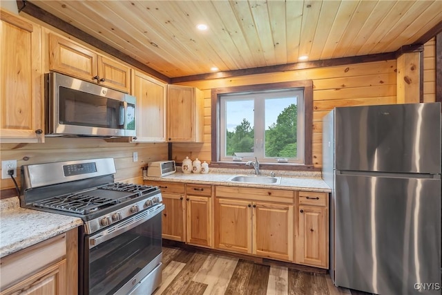 45 Fawn Lake Rd, Orwell, NY 13302 - kitchen featuring stainless steel appliances, wooden ceiling, wood finished floors, light brown cabinets, and wood walls
