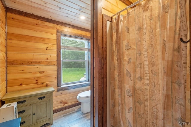 45 Fawn Lake Rd, Orwell, NY 13302 - full bath featuring wood walls and a shower with shower curtain