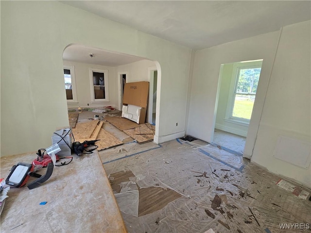 273 Purdy St, Buffalo, NY 14208 - unfurnished living room featuring arched walkways