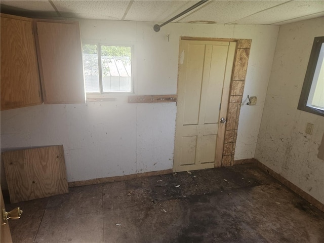 405 Balsam St, Elmira City, NY 14904 - spare room featuring baseboards and a drop ceiling