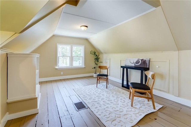 331 E Commercial St, East Rochester, NY 14445 - living area with wood-type flooring and lofted ceiling