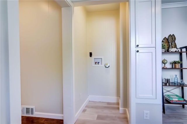 331 E Commercial St, East Rochester, NY 14445 - washroom with washer hookup and light wood-type flooring