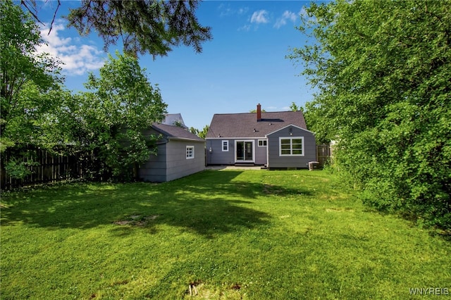 295 Westchester Blvd, Tonawanda-Town, NY 14217 - rear view of property featuring a chimney and an outdoor structure