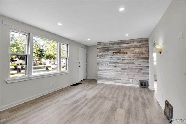 295 Westchester Blvd, Tonawanda-Town, NY 14217 - unfurnished living room featuring recessed lighting, an accent wall, wood finished floors, and wood walls