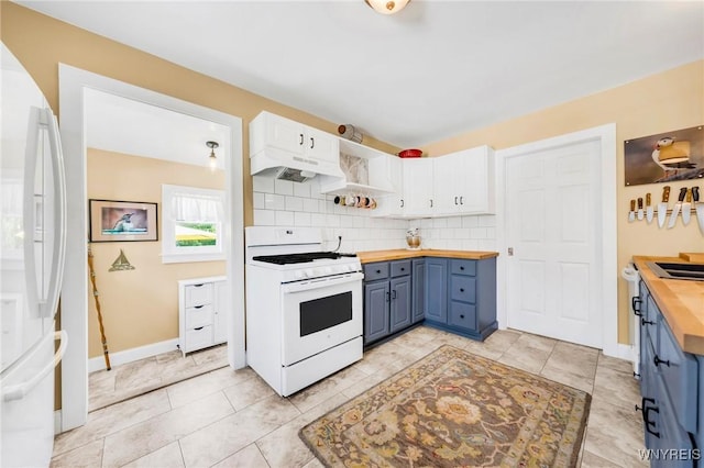 3121 Maple Rd, Wilson, NY 14108 - kitchen featuring white appliances, butcher block countertops, blue cabinetry, under cabinet range hood, and backsplash