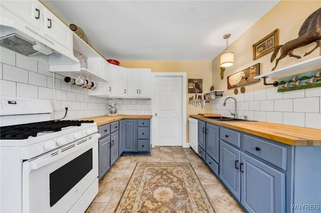 3121 Maple Rd, Wilson, NY 14108 - kitchen with white gas range oven, butcher block countertops, blue cabinets, open shelves, and decorative backsplash