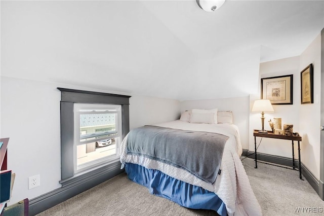 3121 Maple Rd, Wilson, NY 14108 - bedroom with carpet floors and vaulted ceiling