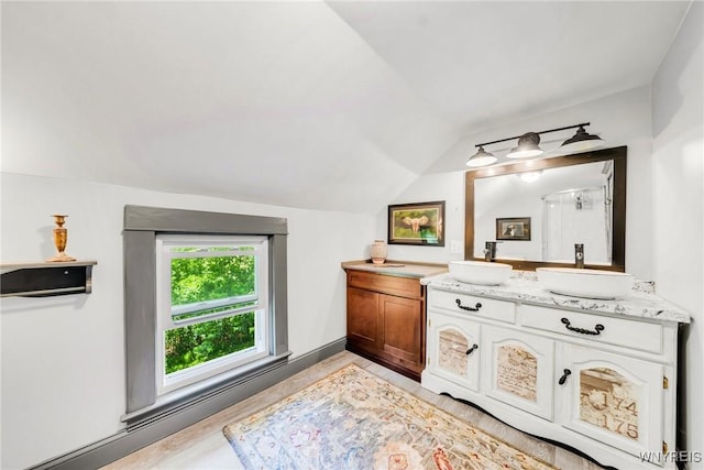 3121 Maple Rd, Wilson, NY 14108 - full bathroom with lofted ceiling and vanity