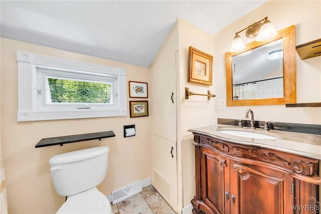 3121 Maple Rd, Wilson, NY 14108 - bathroom featuring vanity, vaulted ceiling, and tile patterned flooring