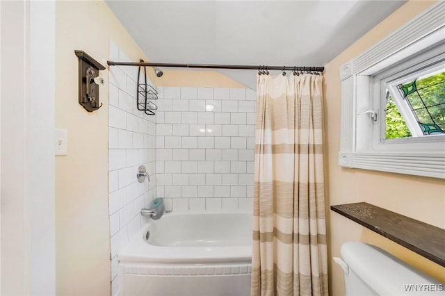 3121 Maple Rd, Wilson, NY 14108 - bathroom with shower / tub combo with curtain and toilet