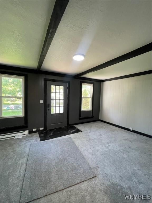 43 Union St, Collins, NY 14070 - entrance foyer with carpet, a textured ceiling, beamed ceiling, and baseboard heating
