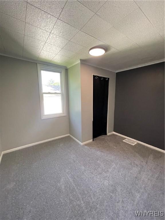 43 Union St, Collins, NY 14070 - empty room featuring carpet flooring and crown molding