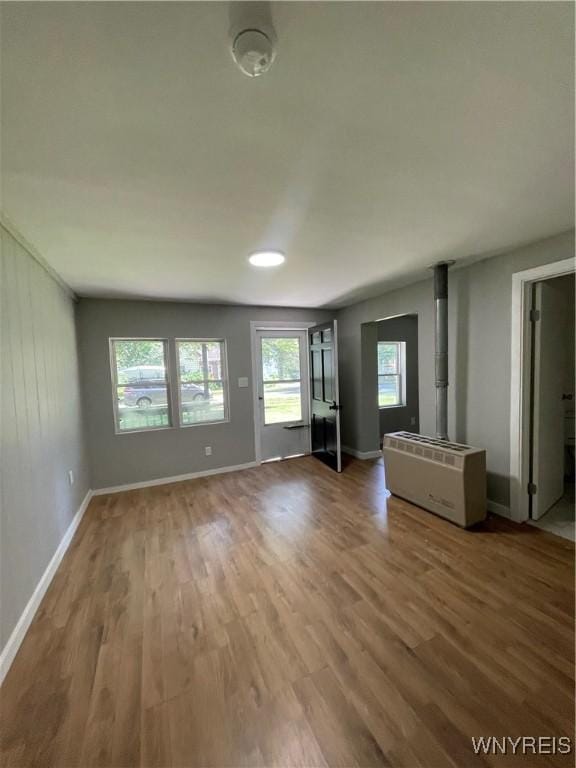 43 Union St, Collins, NY 14070 - unfurnished living room featuring wood finished floors and baseboards