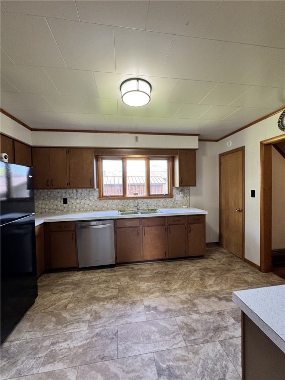 519 N Elk Ave, Kane Boro, PA 16735 - kitchen featuring stainless steel dishwasher, freestanding refrigerator, light countertops, decorative backsplash, and crown molding