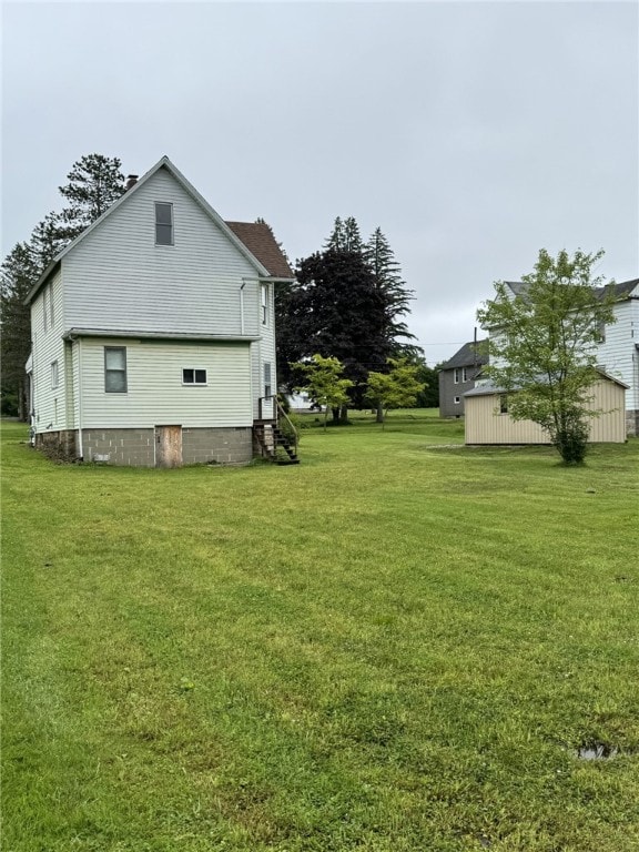 519 N Elk Ave, Kane Boro, PA 16735 - view of property exterior featuring a yard