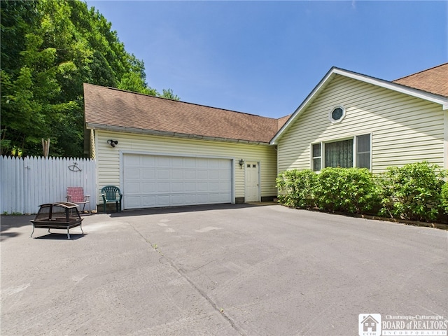 1501 Windfall Rd, Olean, NY 14760 - view of front of home featuring an attached garage, a shingled roof, and driveway