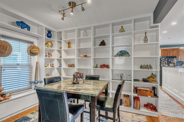 592 Parkside Ave, Buffalo, NY 14216 - dining room featuring light wood-type flooring and built in features