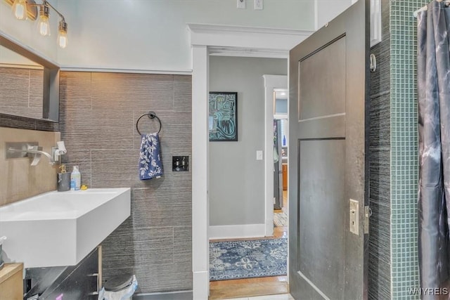 592 Parkside Ave, Buffalo, NY 14216 - bathroom featuring vanity and tile walls