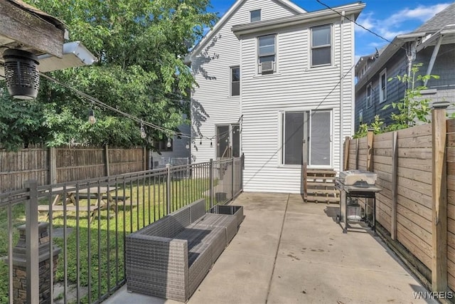 592 Parkside Ave, Buffalo, NY 14216 - back of house featuring entry steps, a patio, and a fenced backyard