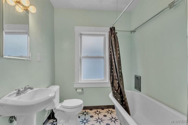 592 Parkside Ave, Buffalo, NY 14216 - bathroom featuring plenty of natural light and shower / tub combo with curtain