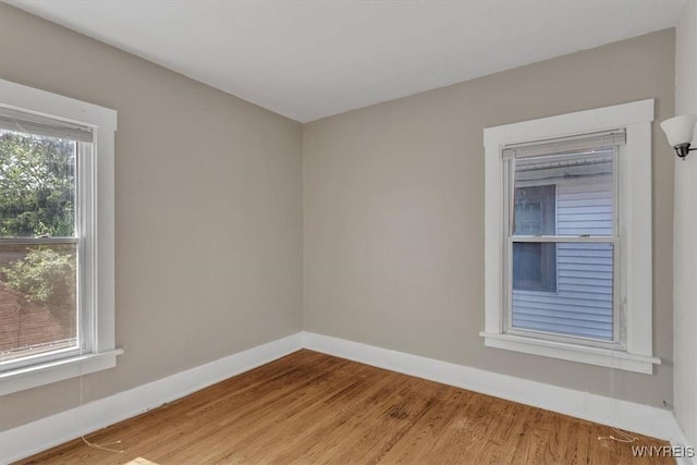 592 Parkside Ave, Buffalo, NY 14216 - unfurnished room with wood finished floors and baseboards