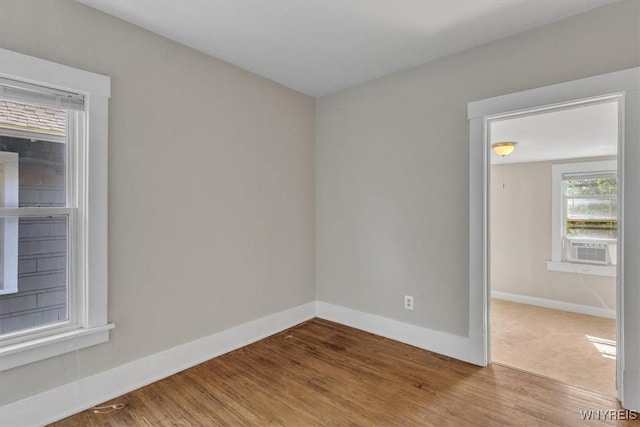 592 Parkside Ave, Buffalo, NY 14216 - spare room with baseboards and wood finished floors