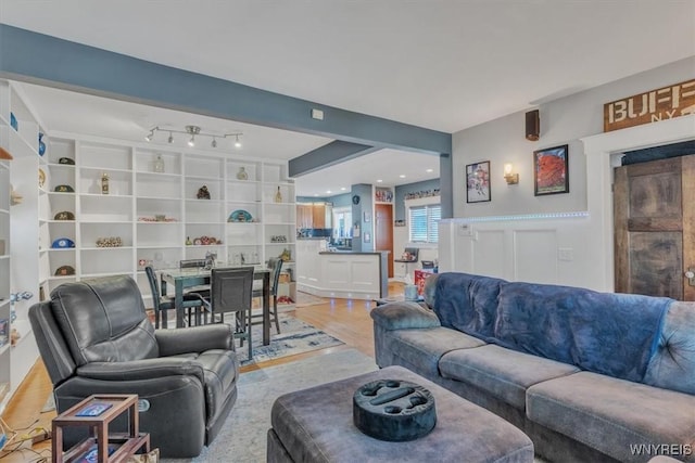 592 Parkside Ave, Buffalo, NY 14216 - living area with wainscoting and light wood finished floors