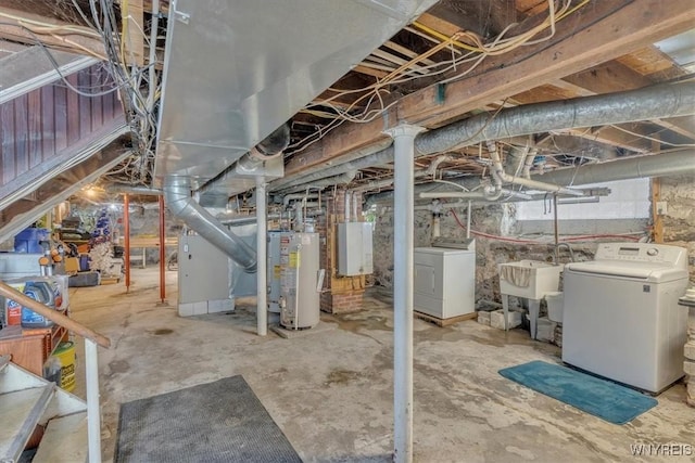 592 Parkside Ave, Buffalo, NY 14216 - unfinished below grade area featuring water heater, washer and clothes dryer, and tankless water heater