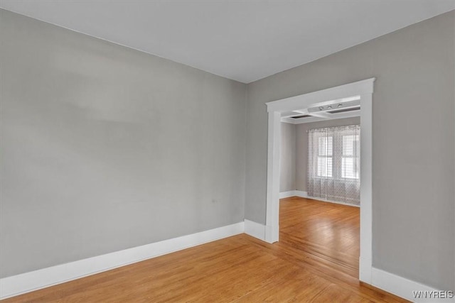 592 Parkside Ave, Buffalo, NY 14216 - empty room with baseboards and light wood-style flooring
