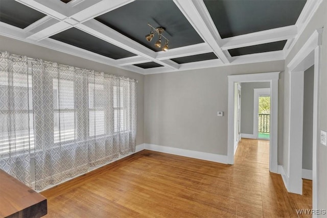 592 Parkside Ave, Buffalo, NY 14216 - empty room featuring coffered ceiling, wood finished floors, and beamed ceiling