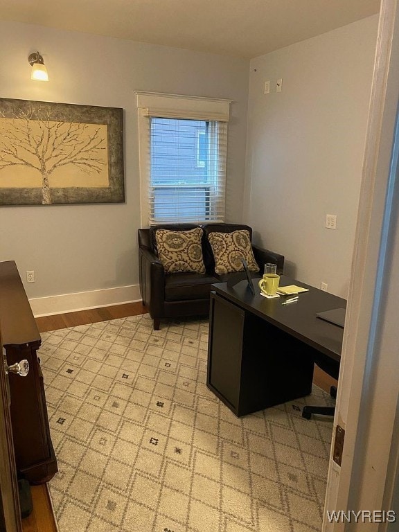592 Parkside Ave, Buffalo, NY 14216 - home office featuring baseboards and light wood-style flooring