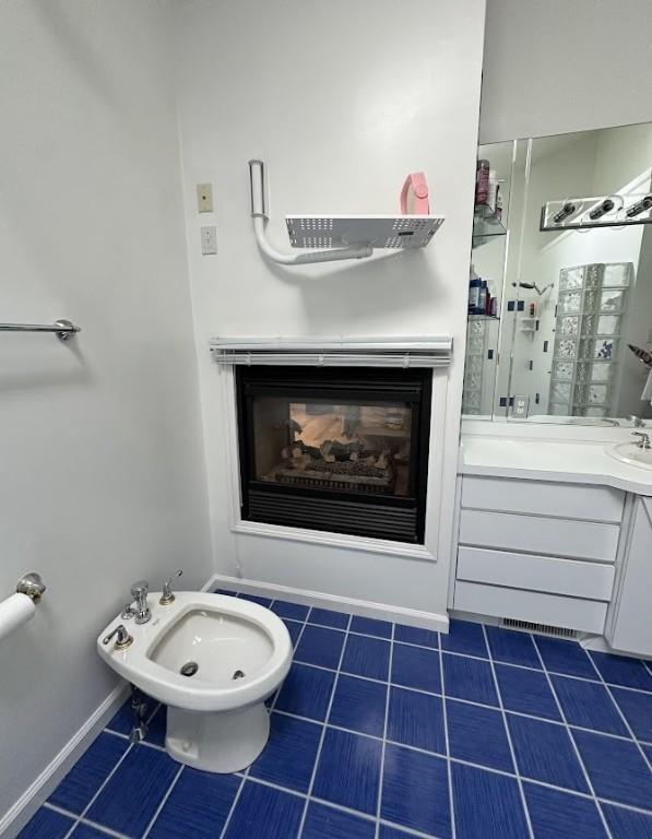 80 Endicar Dr, Irondequoit, NY 14622 - bathroom featuring tile patterned flooring, a bidet, and vanity