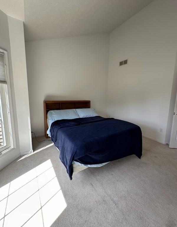 80 Endicar Dr, Irondequoit, NY 14622 - carpeted bedroom featuring baseboards