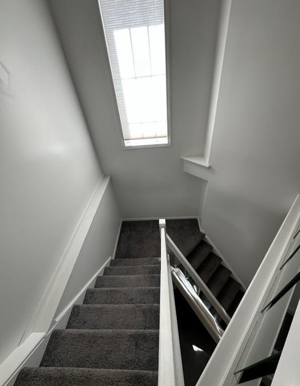 80 Endicar Dr, Irondequoit, NY 14622 - staircase featuring carpet floors
