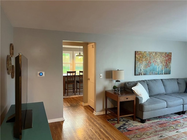 584 Falstaff Rd, Irondequoit, NY 14609 - living room featuring wood finished floors and baseboards