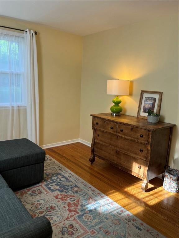 584 Falstaff Rd, Irondequoit, NY 14609 - sitting room featuring wood finished floors and baseboards