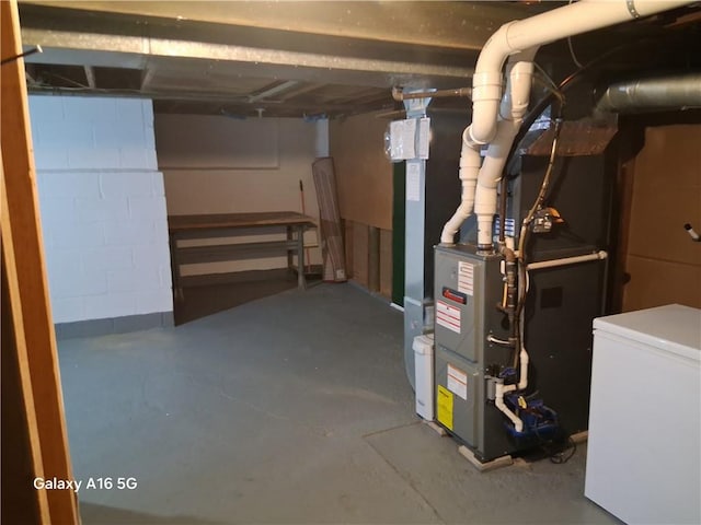 584 Falstaff Rd, Irondequoit, NY 14609 - unfinished basement featuring refrigerator
