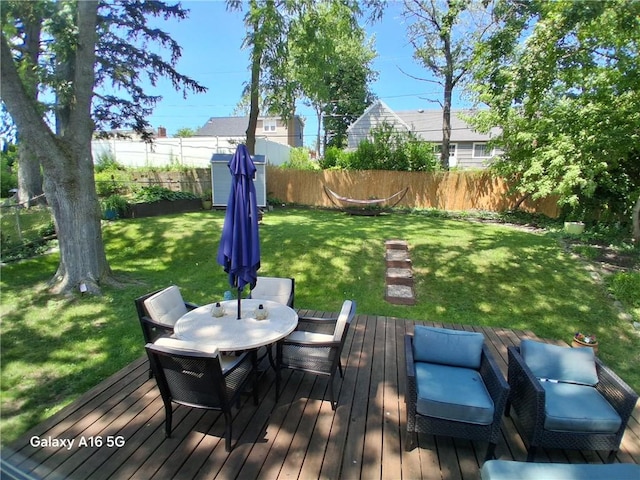 584 Falstaff Rd, Irondequoit, NY 14609 - wooden deck with outdoor dining space
