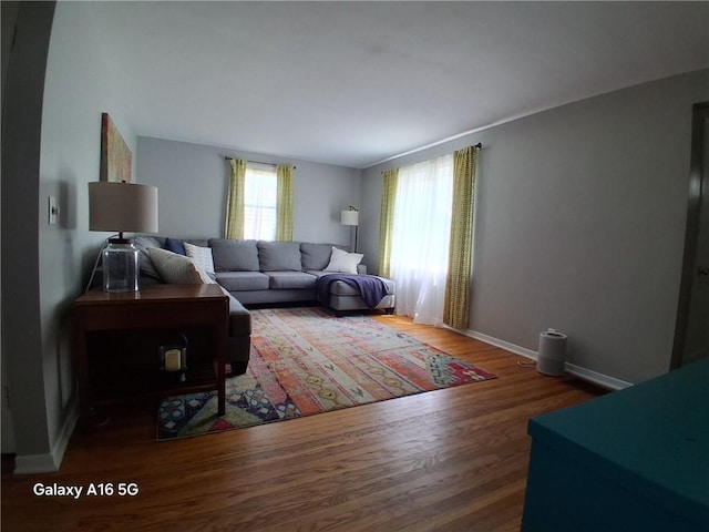 584 Falstaff Rd, Irondequoit, NY 14609 - living area featuring wood finished floors and baseboards