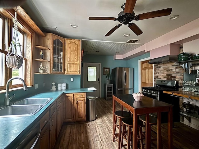 35799 State Highway 10, Hamden, NY 13782 - kitchen featuring stainless steel appliances, light wood-type flooring, healthy amount of natural light, beverage cooler, and recessed lighting