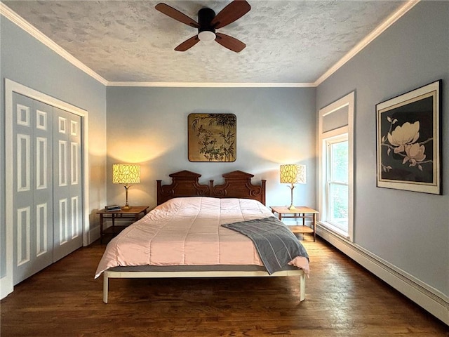 35799 State Highway 10, Hamden, NY 13782 - bedroom featuring wood finished floors, baseboard heating, ornamental molding, a textured ceiling, and ceiling fan