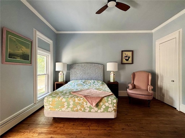 35799 State Highway 10, Hamden, NY 13782 - bedroom with crown molding, wood finished floors, a baseboard heating unit, and a ceiling fan