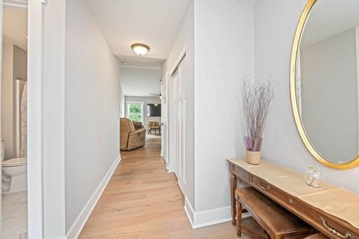 61 Kirkdale Cir, Greece, NY 14612 - corridor with light wood finished floors and baseboards
