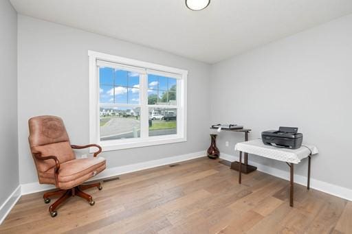 61 Kirkdale Cir, Greece, NY 14612 - living area with wood finished floors