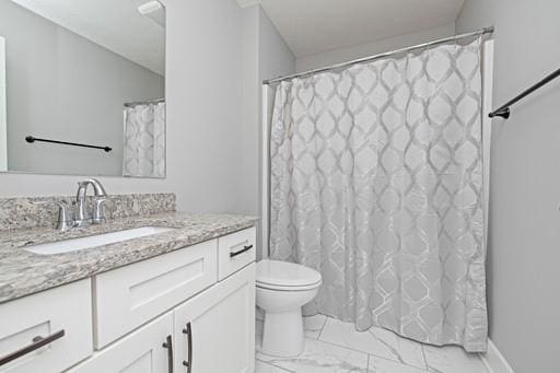61 Kirkdale Cir, Greece, NY 14612 - full bath with marble finish floors, vanity, and a shower with shower curtain