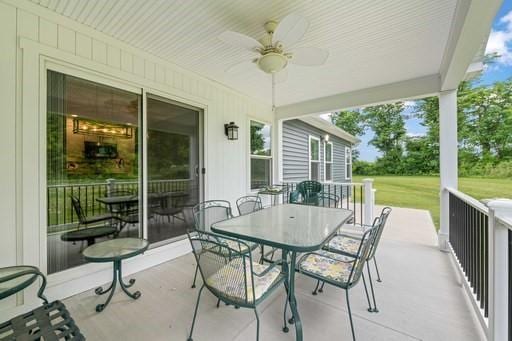 61 Kirkdale Cir, Greece, NY 14612 - view of patio featuring ceiling fan and outdoor dining space