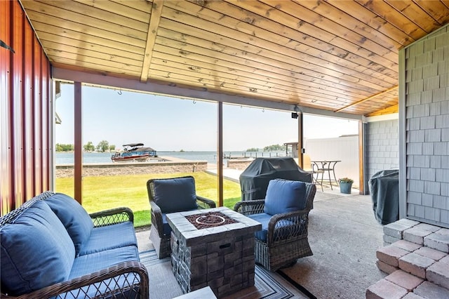 8545 Greig St, Sodus, NY 14555 - view of patio with a water view, an outdoor fire pit, and a grill