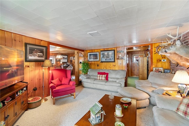8545 Greig St, Sodus, NY 14555 - carpeted living room with wood walls
