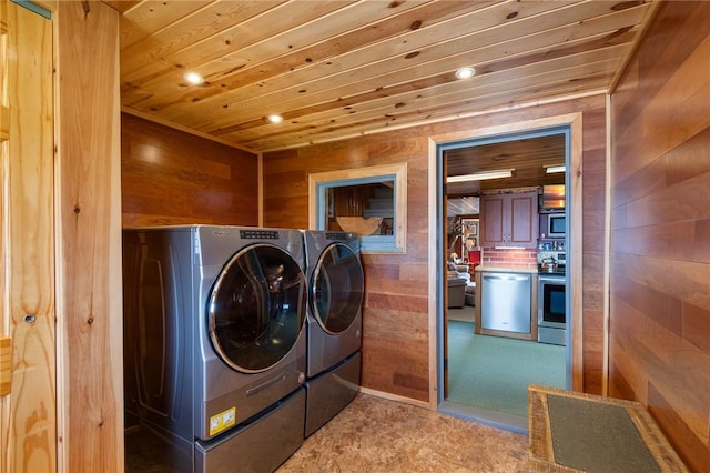 8545 Greig St, Sodus, NY 14555 - laundry area with washing machine and dryer, wooden walls, wood ceiling, and recessed lighting