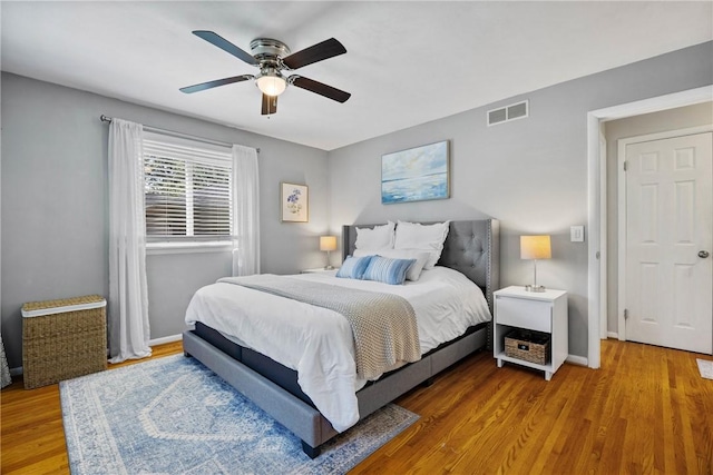 16 Trowbridge Trl, Pittsford, NY 14534 - bedroom with wood finished floors and a ceiling fan